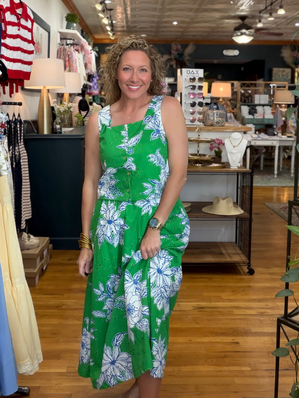 woman wearing a matching skirt and top in a women's store 