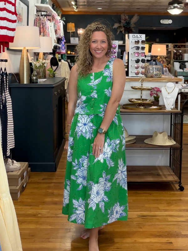 woman wearing a matching skirt and top in a women's store 