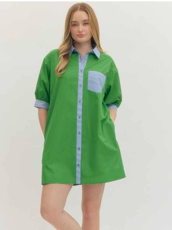 Woman wearing a green dress with a white background
