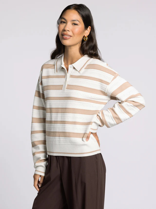 woman wearing brown ivory sweater 