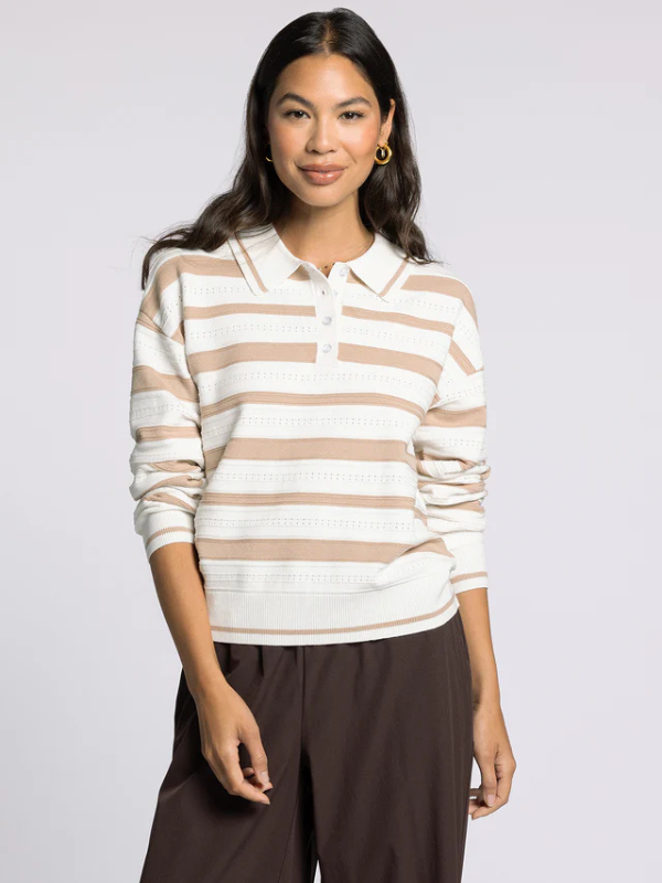 woman wearing brown ivory sweater 