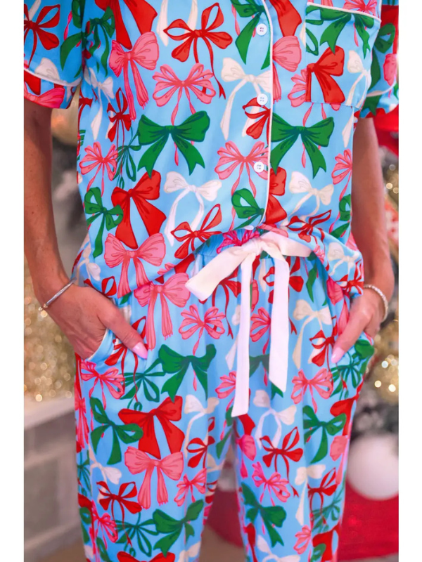 woman wearing Jingle Bows Ruffle Pajama Set