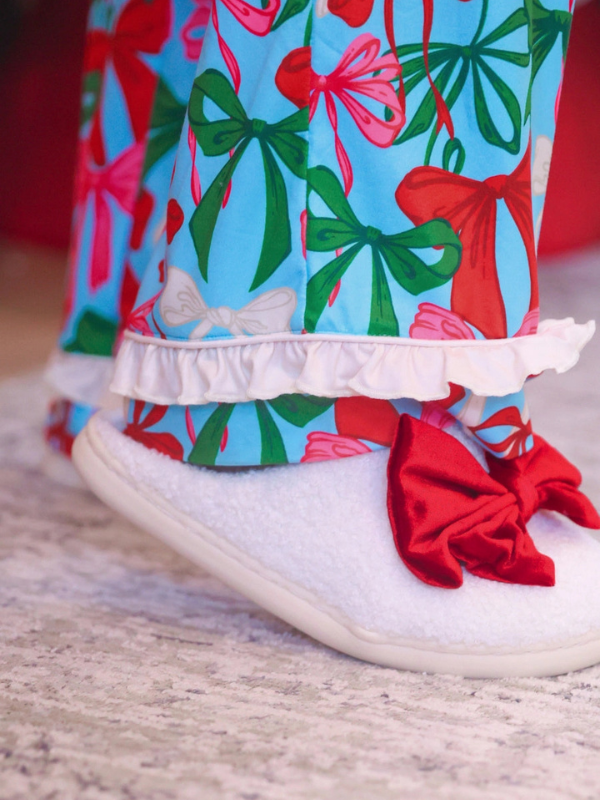woman wearing Jingle Bows Ruffle Pajama Set
