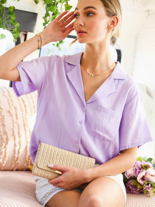 woman wearing lavender button up shirt 