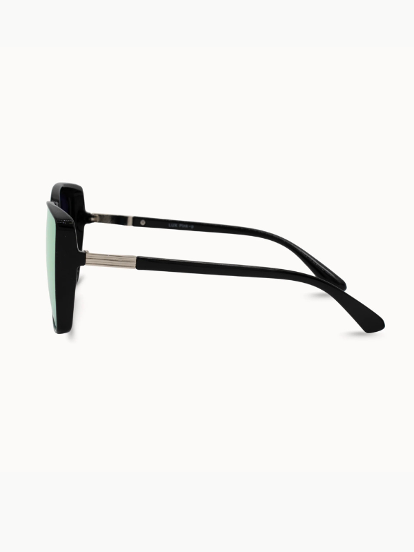 Sunglasses with black frame and green-tinted lenses on a white background