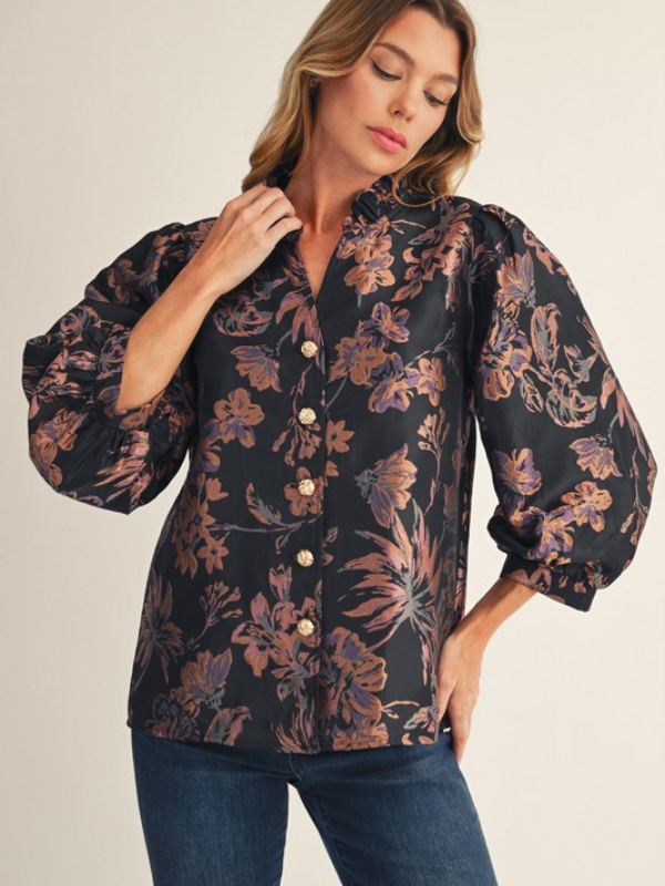 woman wearing mauve and black shirt 