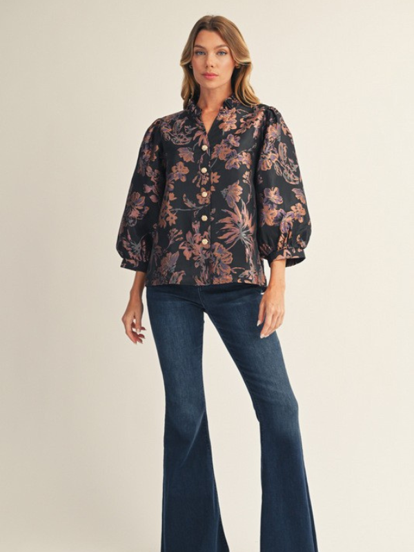 woman wearing mauve and black shirt 