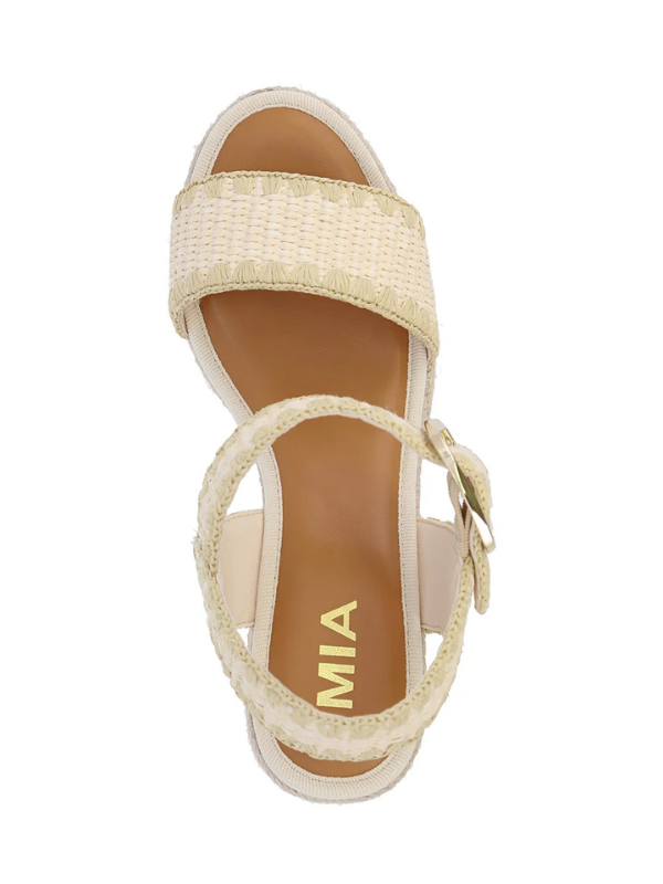 Beige sandal with 'MIA' branding on a white background