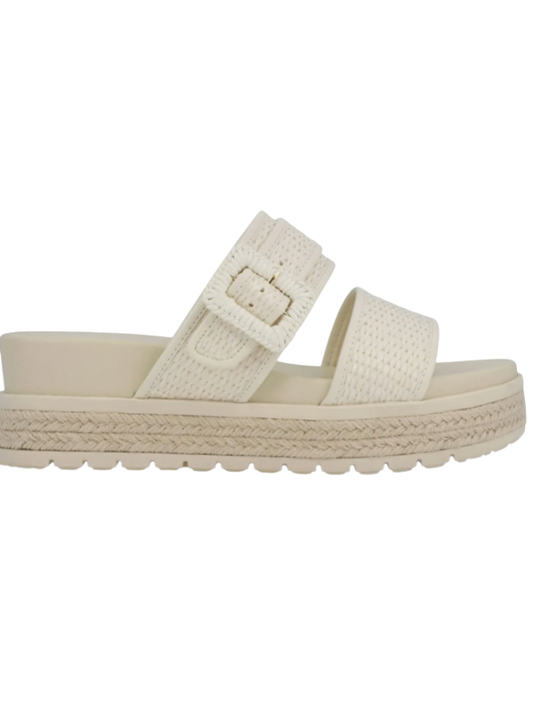 Beige sandal with a woven sole on a white background
