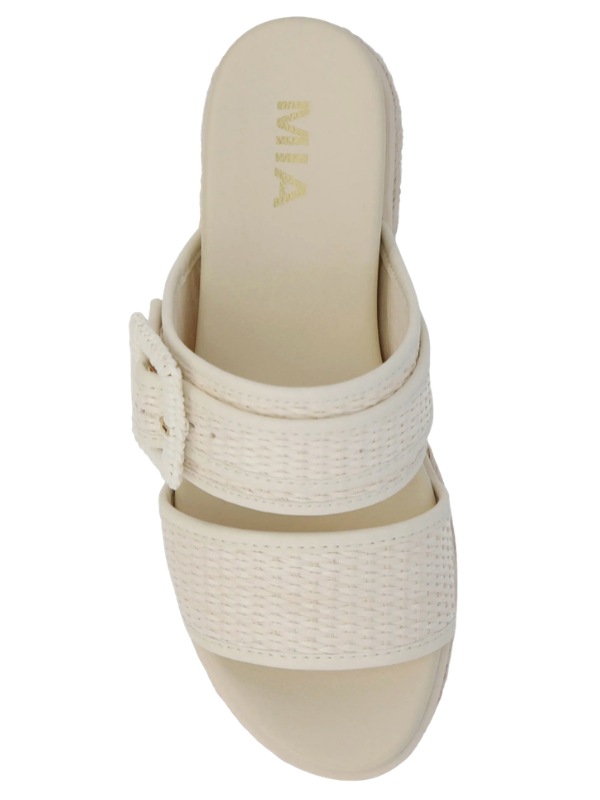 Beige sandal with woven strap on a white background