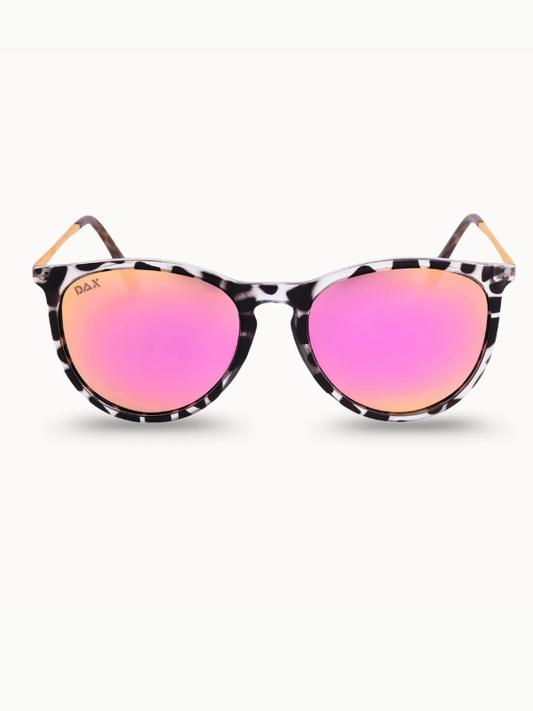 Sunglasses with pink lenses and black and white frame on a white background