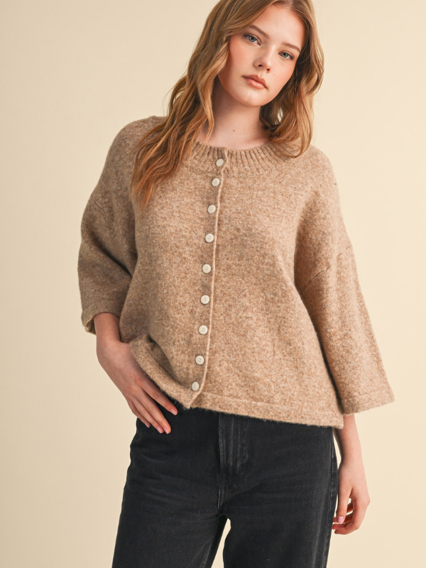 woman wearing a mocha sweater with buttons