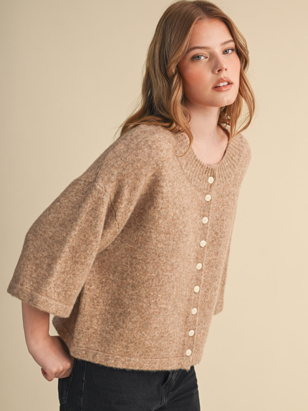 woman wearing a mocha sweater with buttons