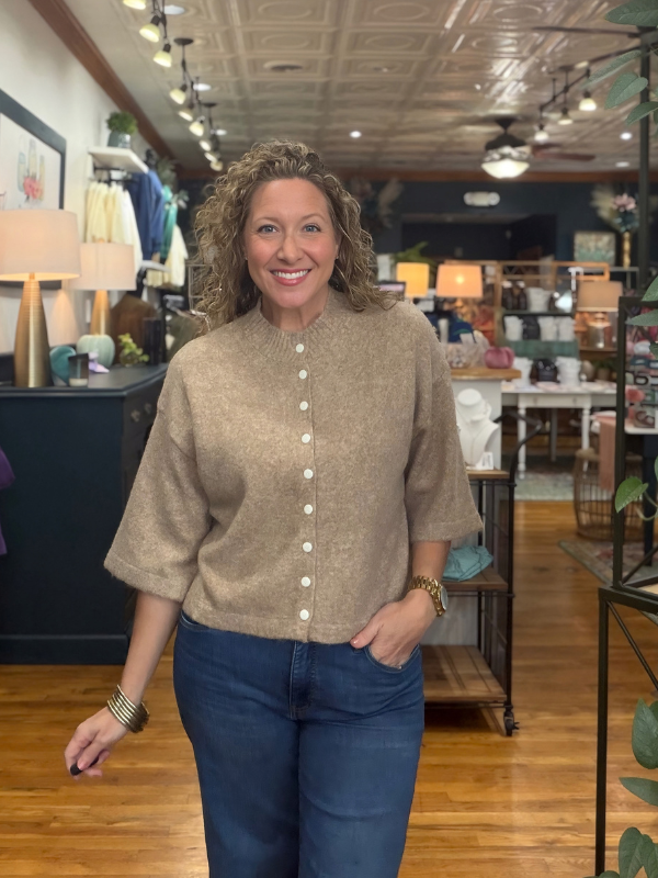 woman wearing a mocha sweater with buttons