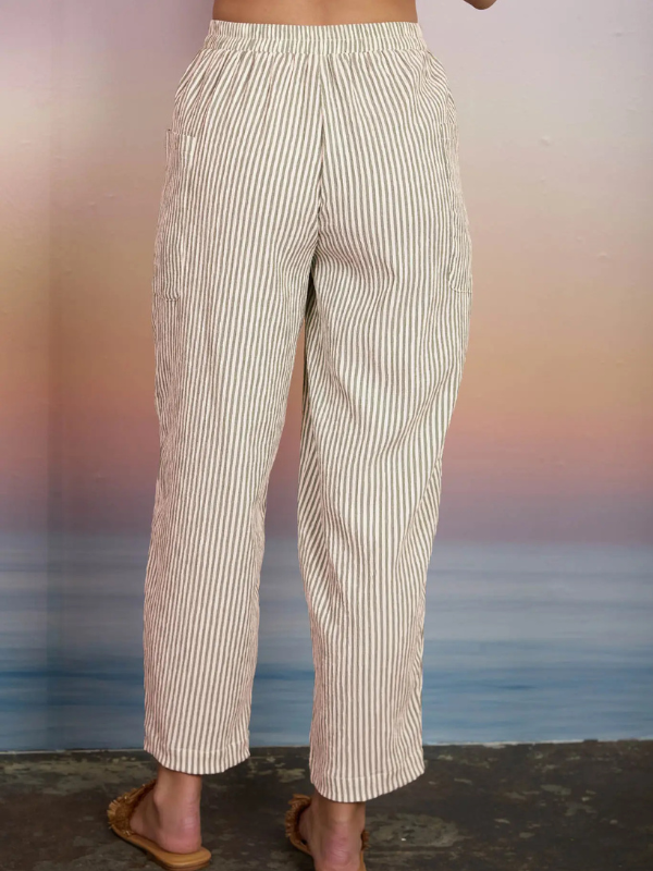 Striped pants worn by a person with a blurred background
