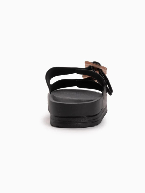 Black sandal with a strap on a white background