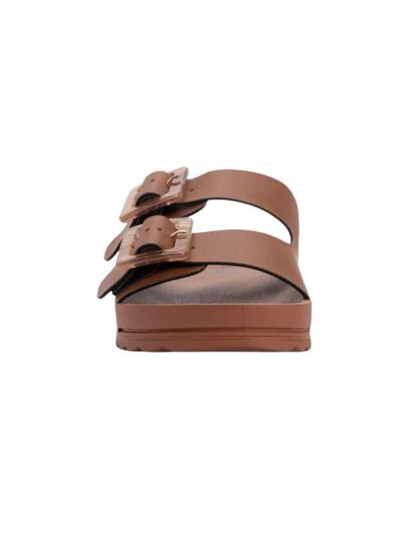 Brown sandal with two straps on a white background