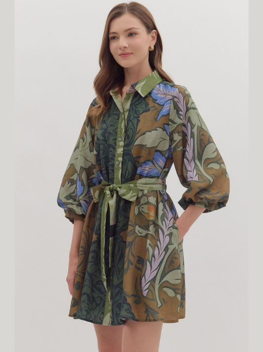 Woman wearing a floral dress with a white background