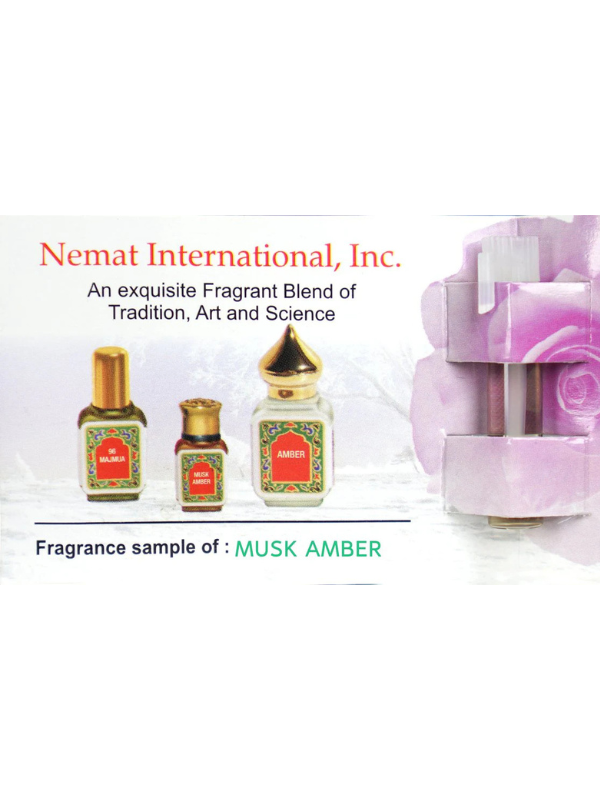 Advertisement for Nemat International, Inc. featuring perfume bottles with text about fragrance blend.