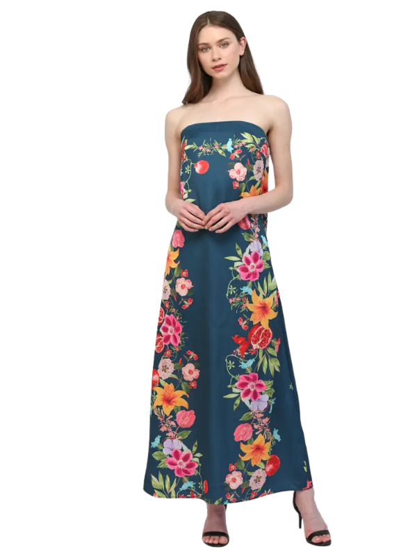 Woman wearing a strapless floral dress on a white background