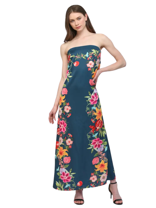 Woman wearing a strapless floral dress on a white background