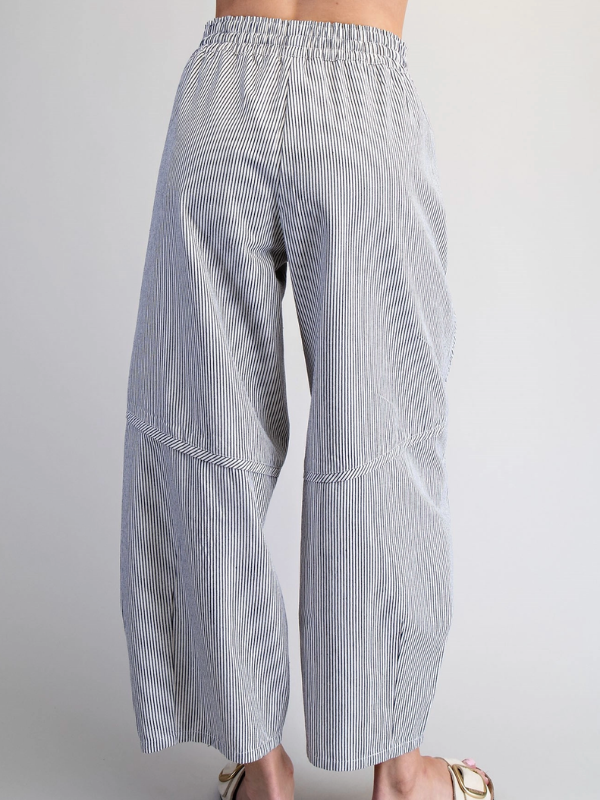 Blue and white striped pants on a gray background