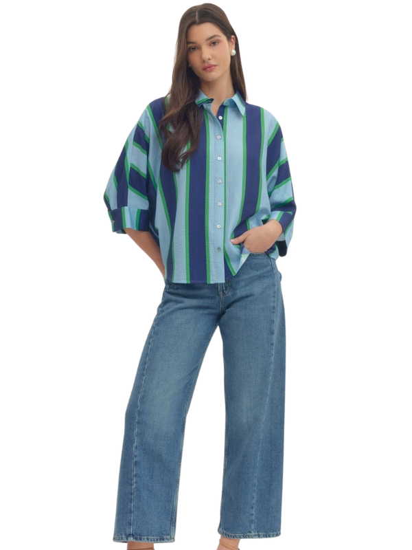 woman wearing a blue striped shirt 