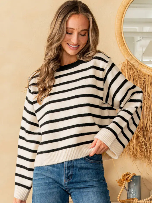 woman wearing striped sweater