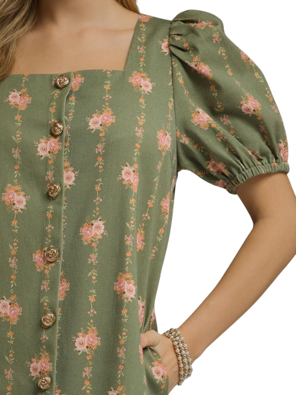 Green floral blouse with puff sleeves on a white background
