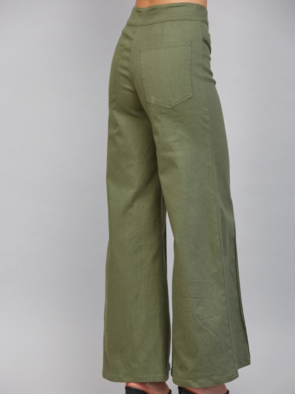 woman wearing olive high waist flair jeans 