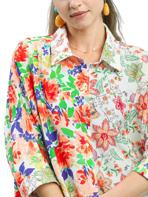 woman wearing floral collared top 