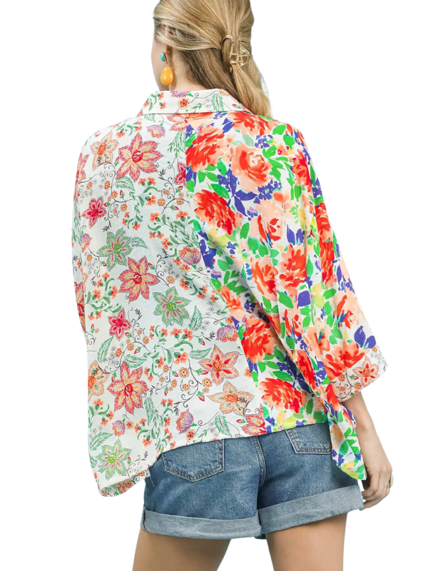 woman wearing floral collared top 
