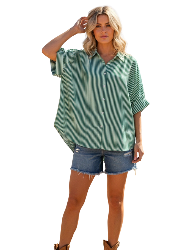 woman wearing a green striped button up top 