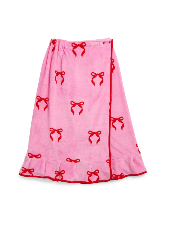 Pink skirt with red bow pattern on a white background