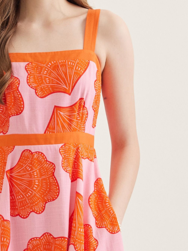 pink and orange dress on a woman 