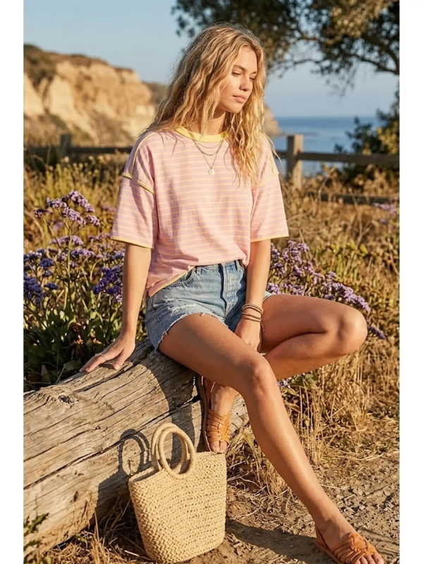 woman wearing striped top and shorts