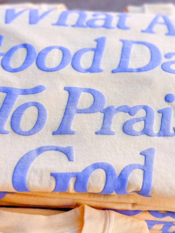 yellow tee shirt that says what a good day to praise God 