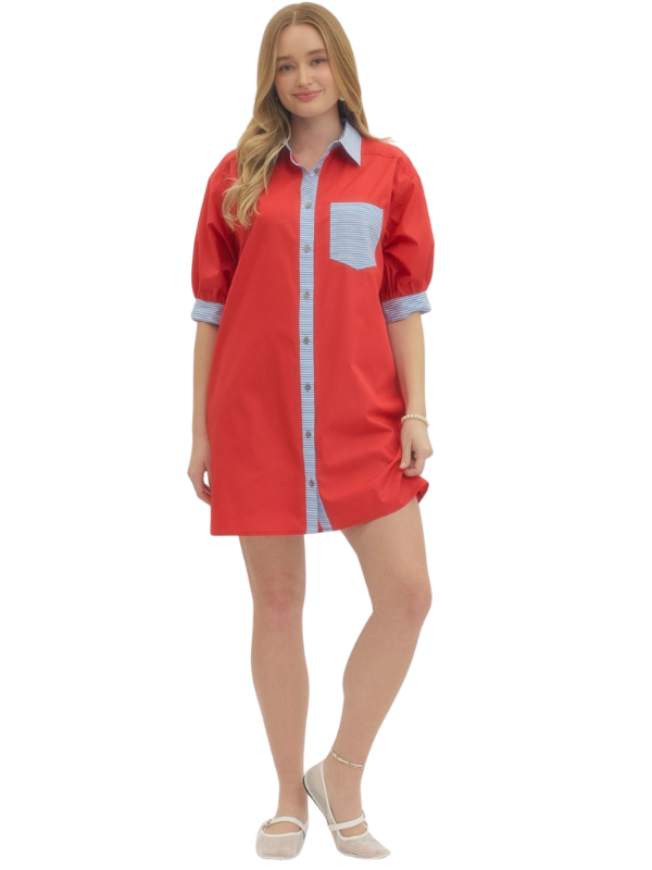 Red dress with white accents worn by a model on a white background