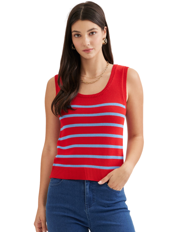 Woman wearing a red and blue striped tank top on a white background