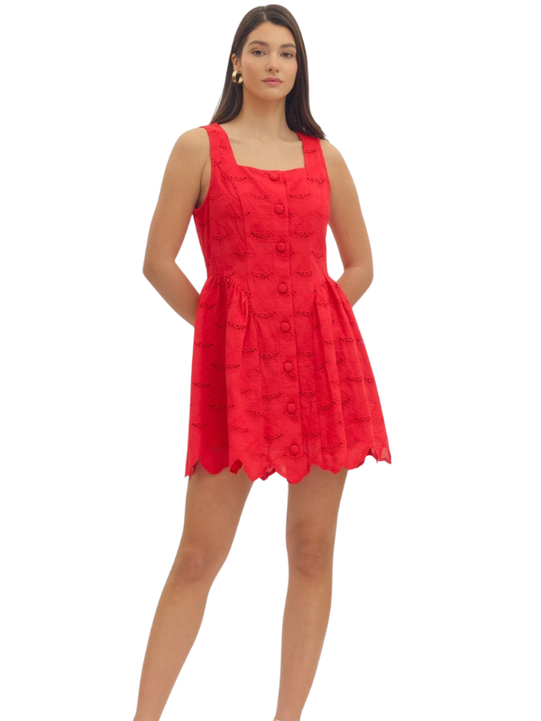 Woman wearing a red dress on a white background
