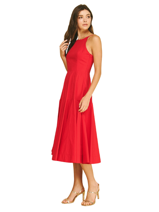 Woman wearing a red dress on a white background