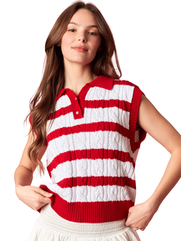 Woman wearing a red and white striped sleeveless sweater on a white background