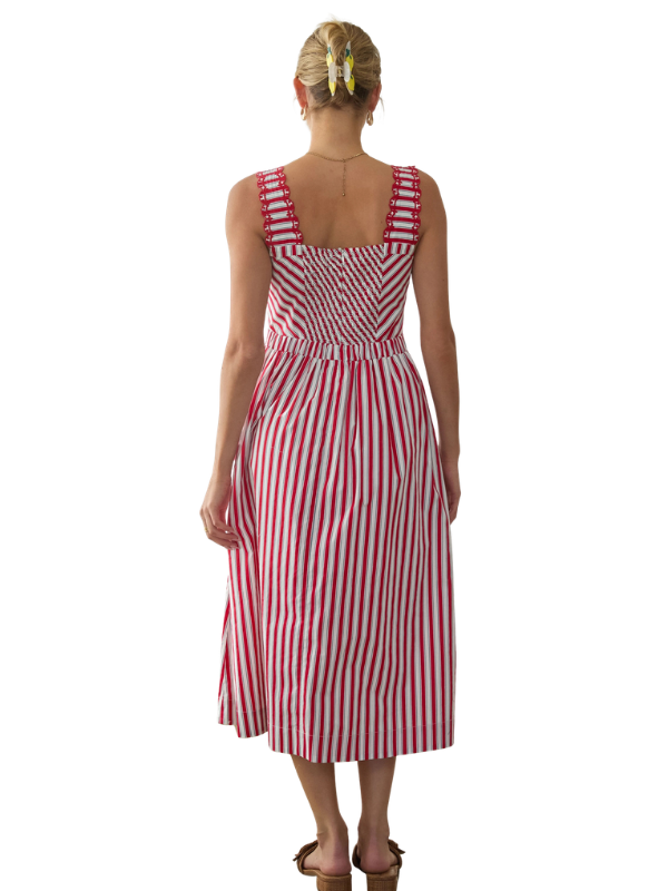 woman wearing a red, white, blue striped dress