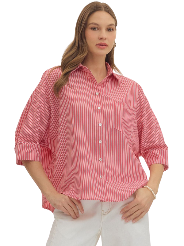 woman wearing a red and whtie striped top 