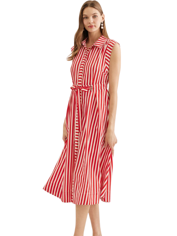 Woman wearing a red and white striped dress on a white background