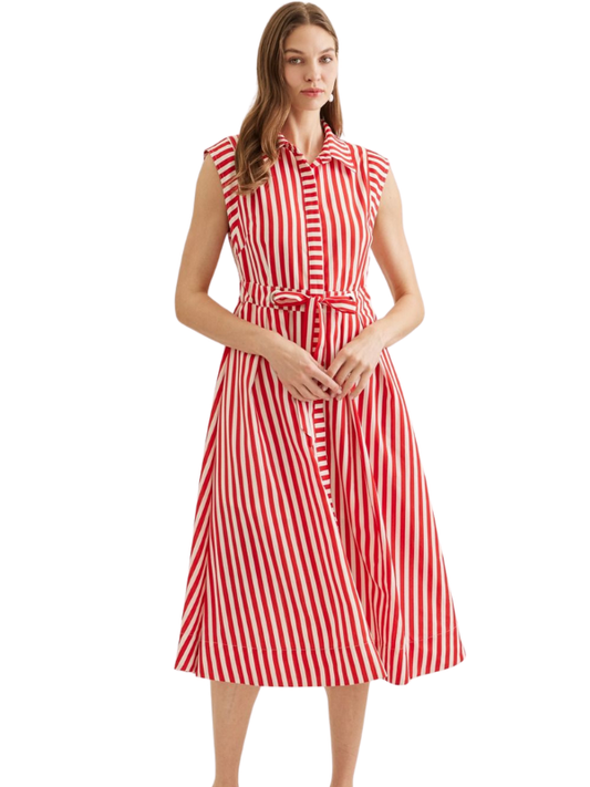 Woman wearing a red and white striped dress on a white background