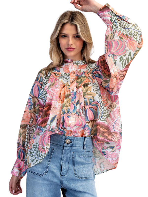 woman wearing long sleeve floral top 