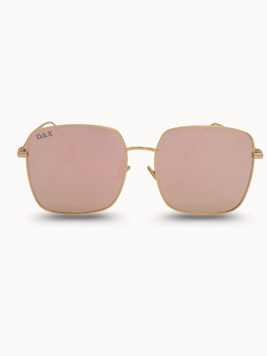 Sunglasses with gold frame and pink lenses on a white background