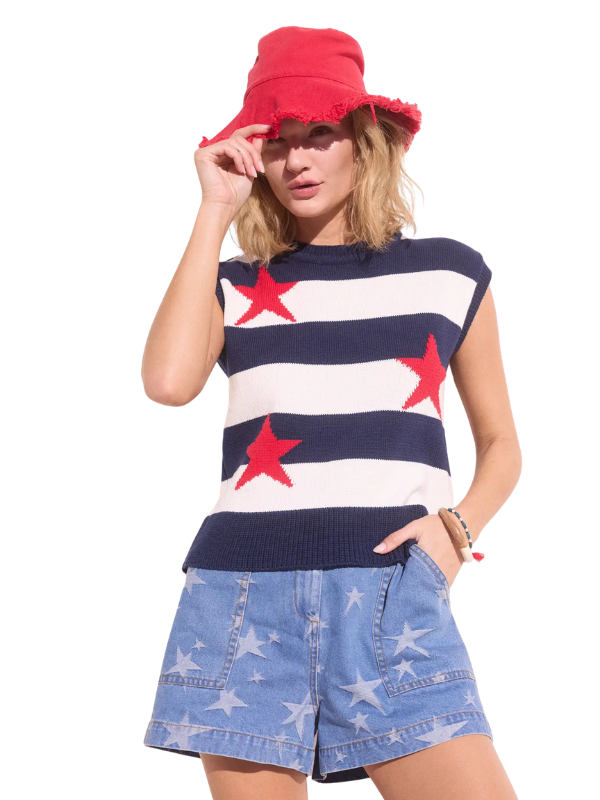 woman wearing a striped top with red stars