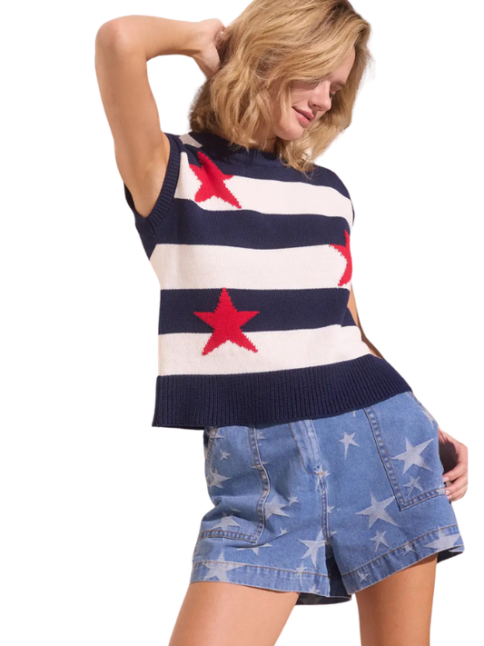 woman wearing a striped top with red stars